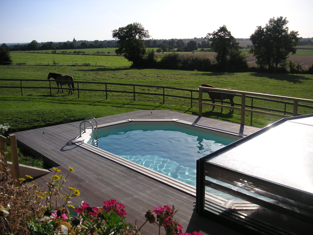 Piscine avec abris et bache solaire
